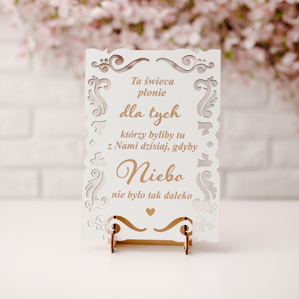 Tabliczka "Ta świeca płonie..." biała