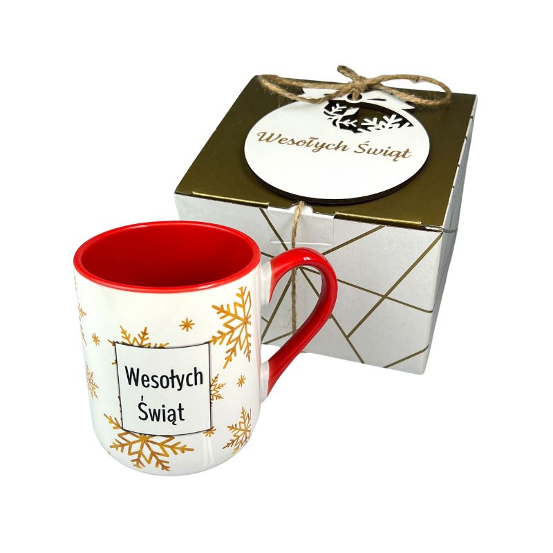 Prezenty Świąteczne dla Firm Złoty Kubek i bombka Wesołych Świąt Zestaw MD1649. Świąteczny kubek z czerwonym uchem i środkiem w zestawie z bombką.